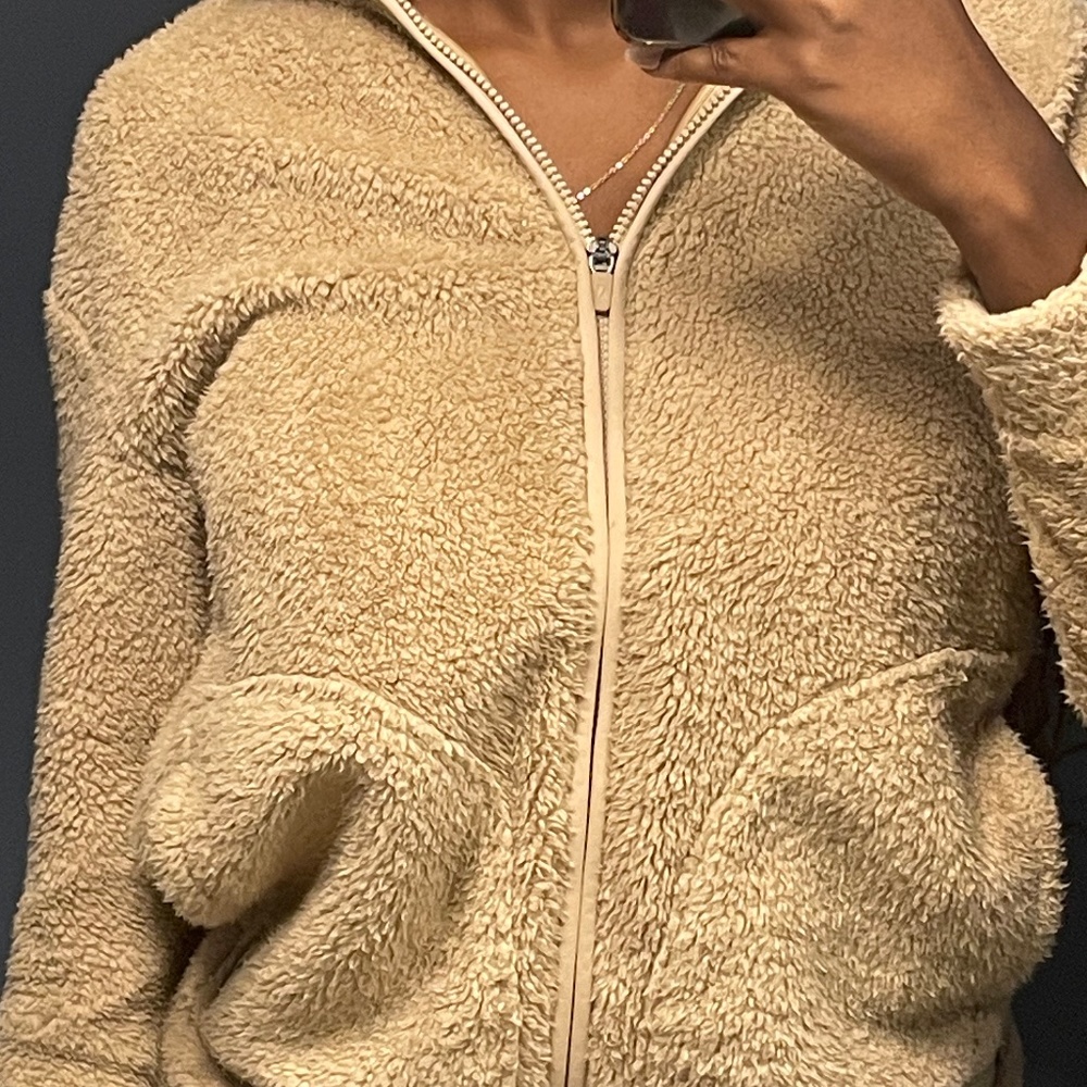 beige soft and comfy sketchers jacket